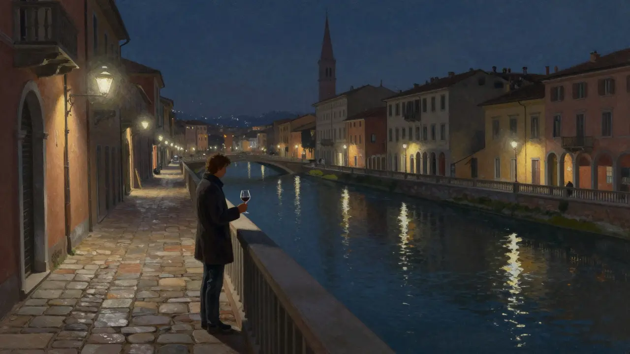 A solitary figure on a Milan balcony overlooking Navigli canals at night, symbolizing connection, discretion, and the quiet beauty of companionship.